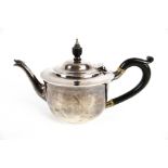 An Edwardian silver small round teapot.