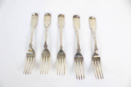 Five various George III and later silver fiddle pattern table forks.