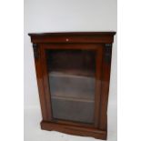 A Victorian rosewood pier cabinet.