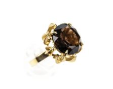 A vintage 9ct gold and round smoky quartz single stone ring. Hallmarks for London 1972, size P, 6.