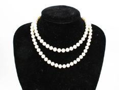 A cultured-freshwater-pearl single row necklace. The beads measure approx. 7.5mm-7.
