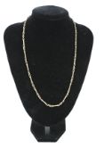 A vintage 9ct gold fancy fetter and three necklace.