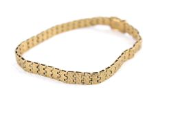 A vintage 9ct gold textured-block bracelet. Stamped 'S&P 9ct', approx. 5.5mm wide, 17.