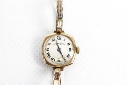 An early 20th century lady's 9ct gold cushion-cased bracelet watch, circa 1925.
