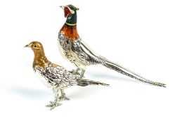 A pair of modern Italian silver and polychrome enamel models of a cock and a hen pheasant.