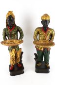 A pair of 19th century style wood and resin hand painted Blackamoors.
