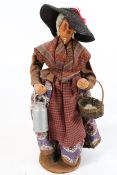 An early 20th century French clay doll.