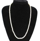 A cultured pearl single row necklace. The 5.7mm-6.