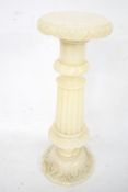 A 19th century style carved white marble column stand.