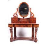 A Victorian Duchess mahogany dressing table.
