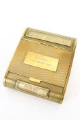 A late Art Deco shaped vintage brass perpetual desk calendar cigarette box.