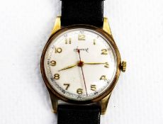 Accurist, a 9ct gold mid-size tonneau-shaped wrist watch, circa 1949.