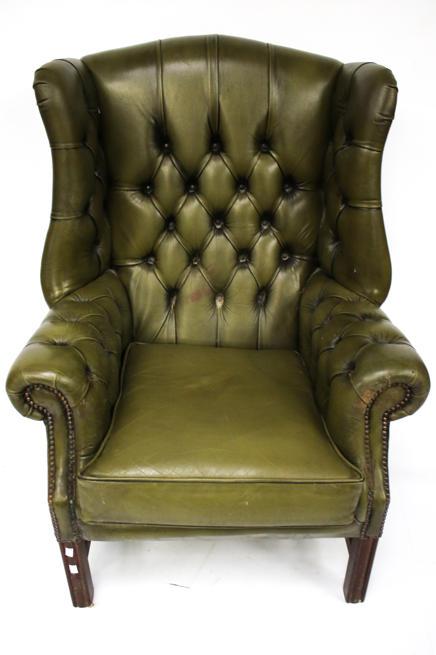 A 20th century Georgian Style green leather button back upholstered wing back armchair and - Image 2 of 3