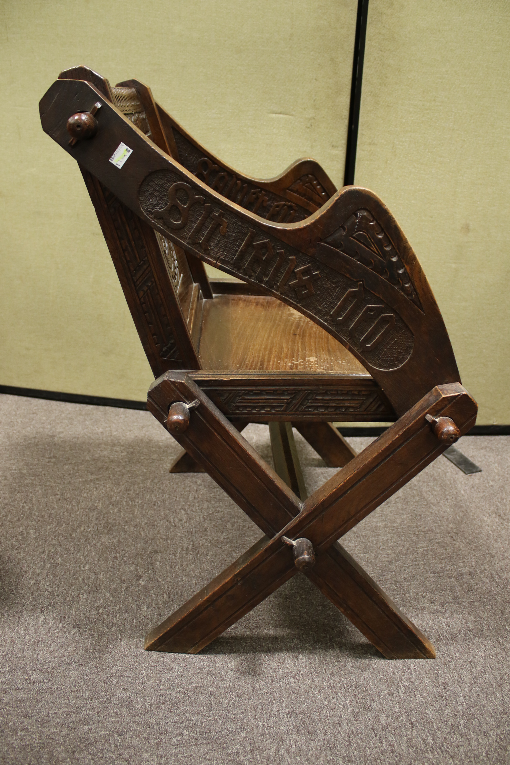 A late 19th century oak 'Glastonbury' chair. - Image 6 of 7