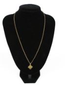 A vintage gold Jerusalem cross pendant and chain.