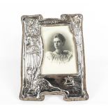 An early 20th century silver mounted oak easel-back 'Valkyrie' photograph frame.
