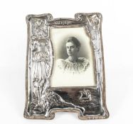 An early 20th century silver mounted oak easel-back 'Valkyrie' photograph frame.
