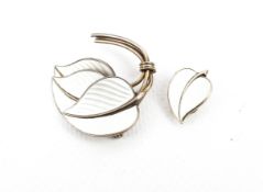 A Norwegian '925S Sterling' and cream enamelled triple-leaf brooch and a single clip earring.