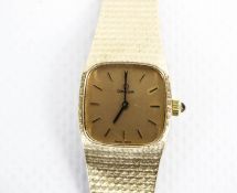 Omega, a lady's Swiss 9ct gold oblong bracelet watch, circa 1979.