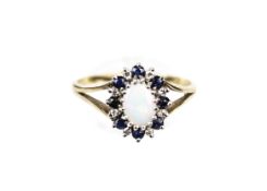 A 9ct gold, opal, sapphire and diamond cluster ring.