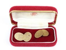 A pair of vintage 9ct gold oval twin-panel cufflinks.