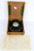 A ' Lawrence & Mayo, London ' with silvered dial wind speed meter. No. 1092, cased.