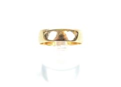 A late Victorian 12ct rose gold broad wedding band. Hallmarks for Birmingham 1893, 5.