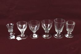 Six 19th century drinking glasses. All of different sizes and designs, Max. H13.