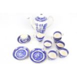 A vintage Victorian porcelain 'Old Willow' pattern coffee set.