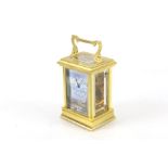 A Halcyon Days English carriage clock.