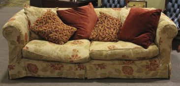 A two part Chesterfield sofa/settee with feather stuffed cushions and tetrad treated cover With