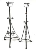 Two vintage adjustable tripod wrought iron lamp bases.
