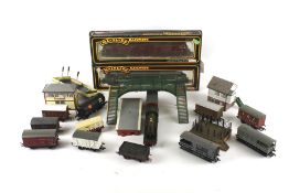 A collection of OO Gauge locomotives and rolling stock.