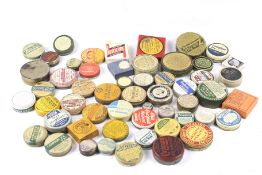 A collection of vintage medical and beauty product tins.