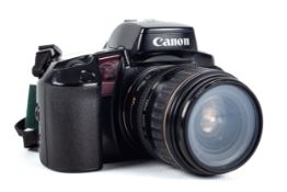 A Canon EOS Elan 35mm SLR camera. With a 28-80mm Ultrasonic lens.