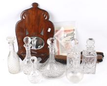 Seven glass decanters and an assortment of collectables.