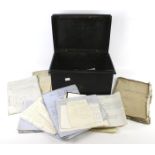 A vintage metal deeds box containing multiple Victorian letters and documents.