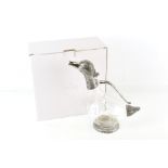 A contemporary claret jug modelled as a duck. In the original box.