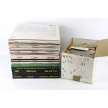 A collection of assorted LP vinyl records and 7" vinyl singles.