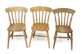 Three pine kitchen dining chairs.