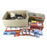 A collection of OO gauge model railway accessories. Including a boxed engine shed, track, etc.