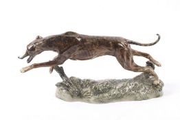 A Peggy Davis pottery prototype greyhound dog figure.