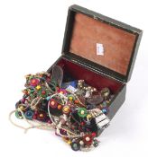 A vintage jewellery box and contents. Including watches, brooches and necklaces, etc.
