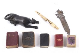 An assortment of mixed small collectables.