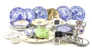 An assortment of silver plated and china items.