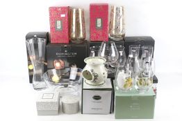 A collection of assorted contemporary glassware.