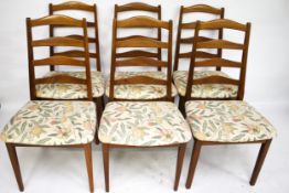 A set of six Mid century G Plan ladder back dining chairs.
