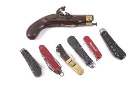 A collection of six assorted penknives and a flintlock pistol. Including Victornox, etc.