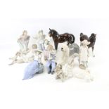 An assortment of ceramic animal and children figures. Including Nao and Beswick examples. Max.