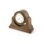 A sheraton revival mahogany mantle timepiece.